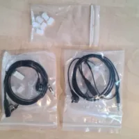 Comset - Combi Aanbieding 2 in-ear air-tube oortelefoon 2 stuks en zakje met 6 oordopjes